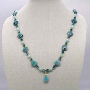 Aqua green Jasmin theme necklace with large silver lobster class.